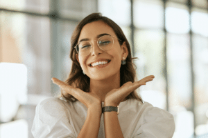 Woman smiling with straight teeth after orthodontic treatment in Lone Tree, CO